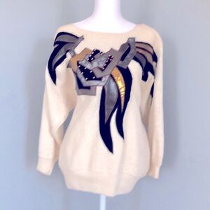 Eighties 1980’s cotton/Ramie knit sweater with velvet and faux leather appliqué.